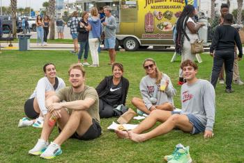 Attendees at The Coastal Alabama Food Truck Festival in Gulf Shores