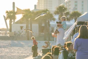 People enjoying Shrimp Fest in Gulf Shores, best beach festival