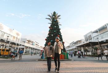 Father and son at The Wharf during Christmas