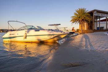 Boat at Flora-Bama Yacht Club waterfront restaurant in Orange Beach