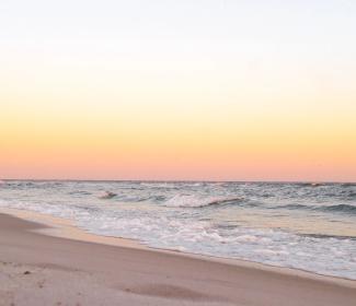 Colorful sunrise over the beach in Gulf Shores