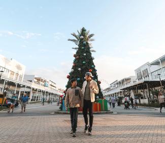 Father and son at The Wharf during Christmas