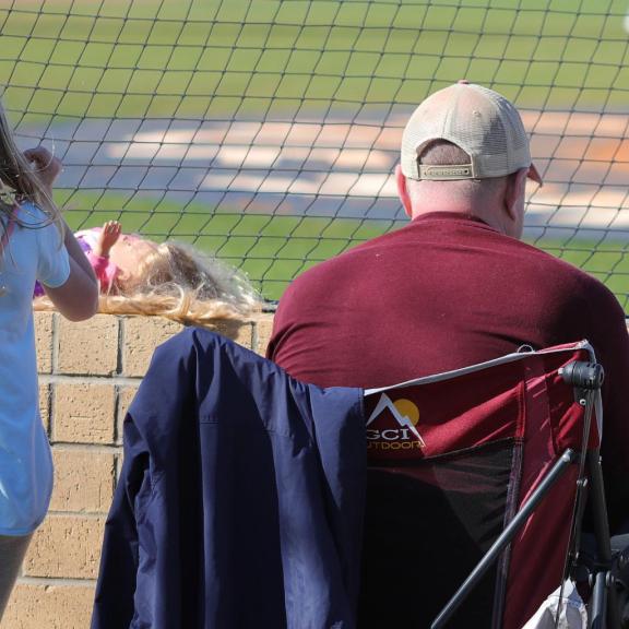 Family Watching Soccer Game