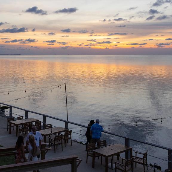 Sunset at Jesse's on the Bay waterfront restaurant in Fort Morgan