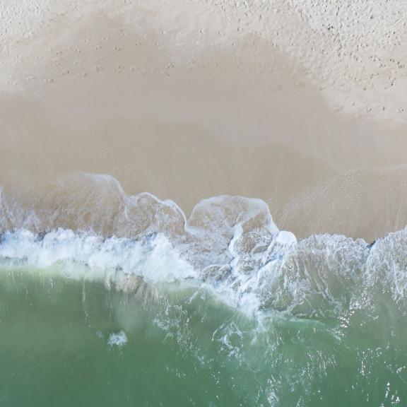 Waves crashing onto the shore of Gulf Shores beach