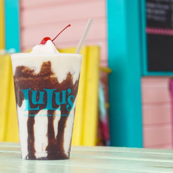 Creamy bushwacker with chocolate drizzle and a cherry at LuLu's waterfront restaurant in Gulf Shores